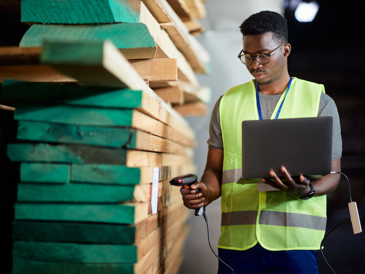 barcode-warehouse-worker-using-laptop