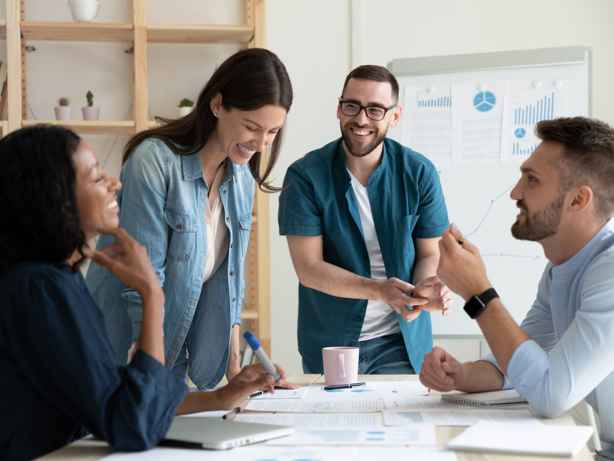 Smiling diverse colleagues