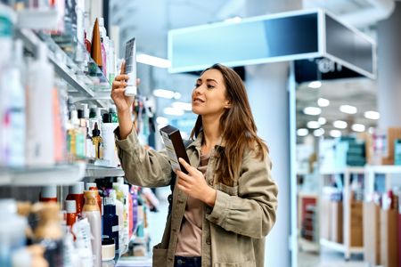 woman enjoying in buying beauty care.jpg